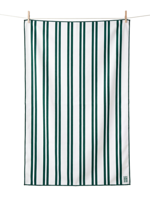 Positano lightweight microfibre travel towel flat lay, white and dark green stripes, quick-dry and compact
