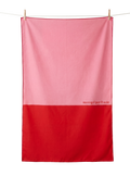 Salerno lightweight microfibre travel towel flat lay, bold pink and red, quick-dry and compact